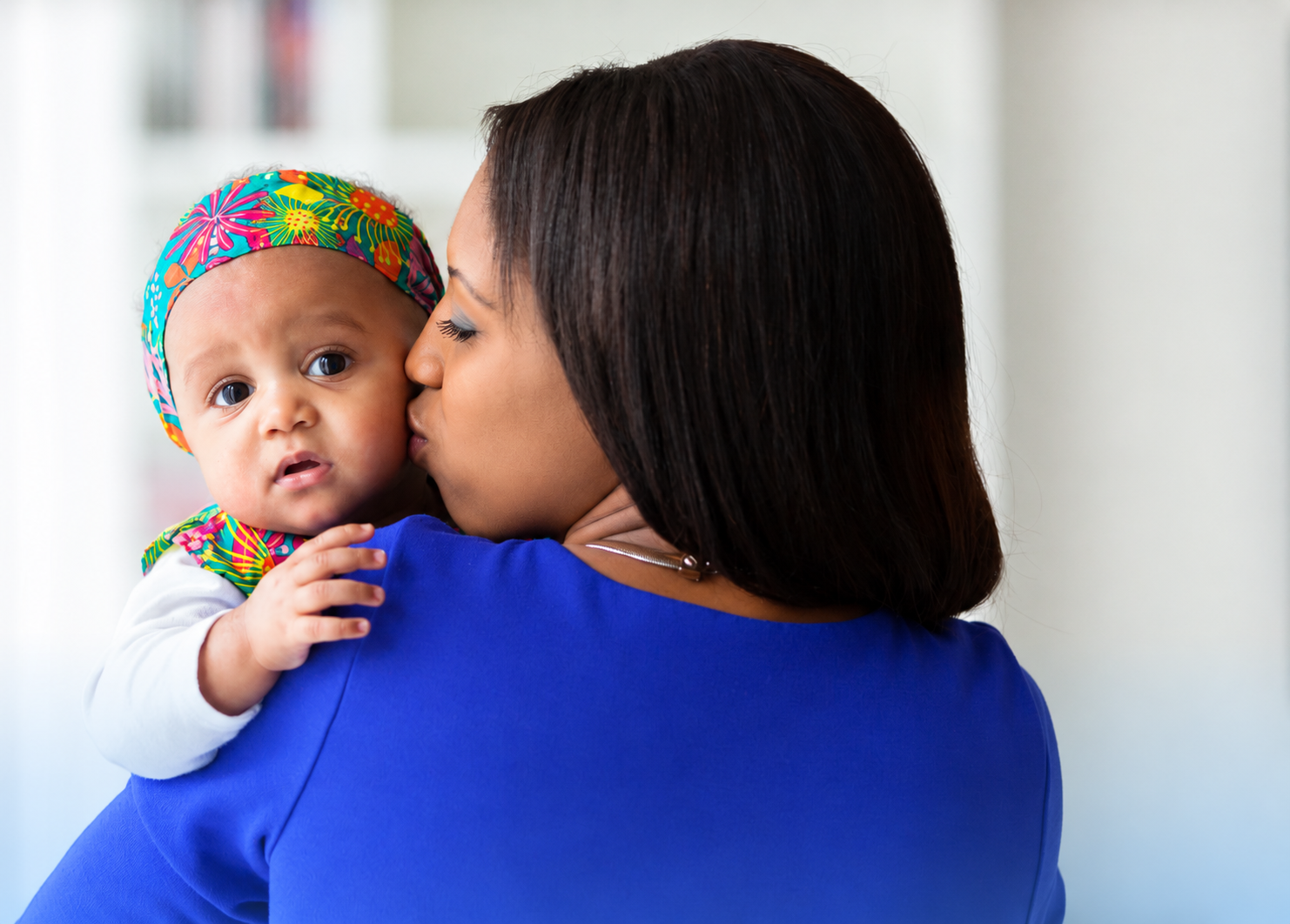 A woman smiling because she knows All Pregnancy Services are Compassionate & Confidential at Daybreak LifeCare Center in Columbia, South Carolina